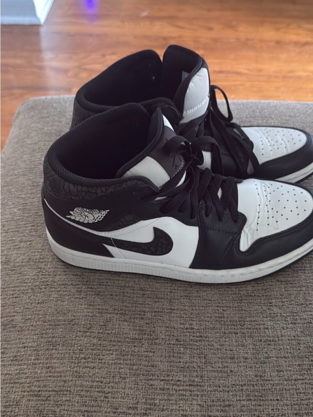 Jordan Black and White Mid-Top Sneakers